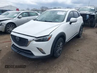 2016 Mazda CX-3 Grand Touring with VIN JM1DKFD73G0129737, listed as a IAAI auction lot 41875808 with 120,547 mi miles. Bid and sale history available at carsss.com. Image 18.