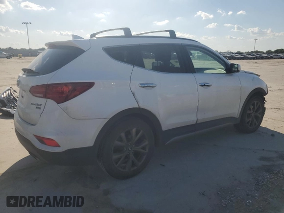 2018 Hyundai Santa Fe Ultimate z VIN 5XYZW4LA6JG566242, wystawiony jako Copart lot #54324655 z przebiegiem 125 543 mil mil oraz Szkoda całkowita • Salvage title. Historia ofert i sprzedaży dostępna na DreamBid. Obrazek 3.