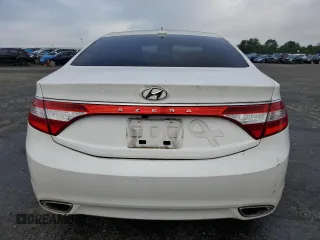 2013 Hyundai Azera с VIN KMHFG4JG8DA228669, выставлен на аукционе Copart как лот 62734185 с пробегом 148 611 миль миль и Чистый • Clean title. История ставок и продаж доступна на DreamBid. Изображение 6.