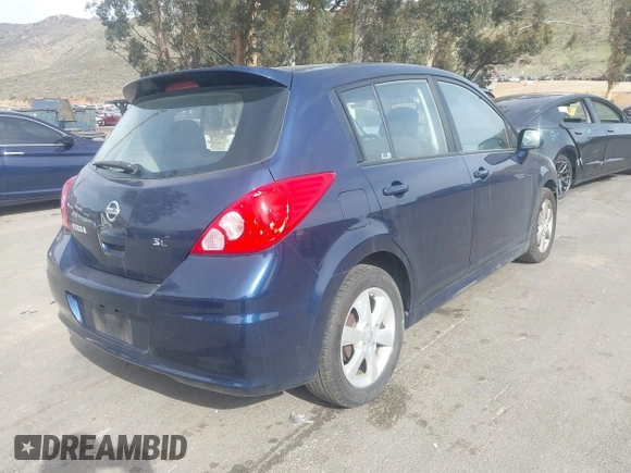2012 Nissan Versa S with VIN 3N1BC1CPXCK250182, listed as a IAAI auction lot 41697818 with 122,450 mi miles. Bid and sale history available at carsss.com. Image 4.