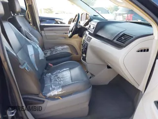 2011 Volkswagen Routan SE with VIN 2V4RW3DG5BR668194, listed as a IAAI auction lot 42483379 with 203,945 mi miles and . Bid and sale history available at DreamBid. Image 5.
