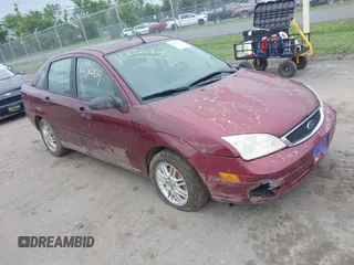 2007 Ford Focus S z VIN 1FAFP34N17W214800, wystawiony jako IAAI lot #42236069 z przebiegiem 158 132 mil mil oraz . Historia ofert i sprzedaży dostępna na DreamBid. Obrazek 1.