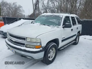 2001 Chevrolet Tahoe LT with VIN 1GNEK13T01J287838, listed as a IAAI auction lot 41551502 with 145,730 mi miles. Bid and sale history available at carsss.com. Image 2.