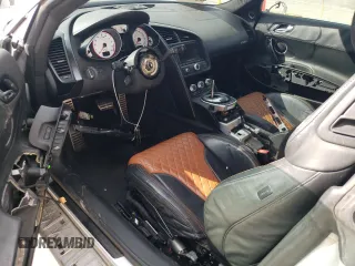 2012 Audi R8 V10 with VIN WUAENAFG0CN000740, listed as a Copart auction lot 47002395 with 60,873 mi miles and Salvage Title. Bid and sale history available at DreamBid. Image 8.
