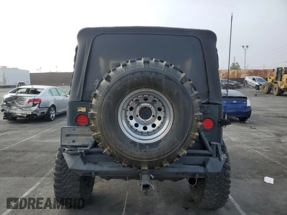 2002 Jeep Wrangler Sahara with VIN 1J4FA59S42P742978, listed as a Copart auction lot 46707685 with 77,272 mi miles and Salvage Title. Bid and sale history available at carsss.com. Image 6.