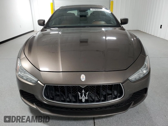 2016 Maserati Ghibli S Q4 with VIN ZAM57RTA4G1168220, listed as a Copart auction lot 57850955 with 126,378 mi miles and Clean title. Bid and sale history available at DreamBid. Image 5.