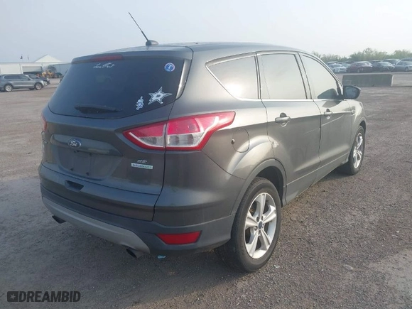 2015 Ford Escape SE with VIN 1FMCU0GX0FUC78365, listed as a IAAI auction lot 41933494 with 197,289 mi miles. Bid and sale history available at carsss.com. Image 4.