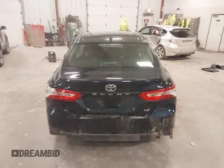 2020 Toyota Camry LE with VIN 4T1C11AK5LU926564, listed as a IAAI auction lot 41864812 with 104,212 mi miles and . Bid and sale history available at carsss.com. Image 16.