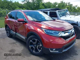 2017 Honda CR-V Touring with VIN 2HKRW1H99HH504835, listed as a IAAI auction lot 42231143 with 50,120 mi miles and . Bid and sale history available at DreamBid. Image 1.
