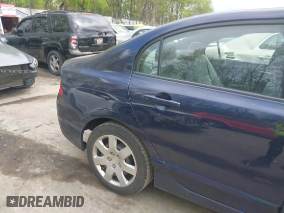 2010 Honda Civic LX with VIN 2HGFA1F52AH570385, listed as a IAAI auction lot 42234739 with 199,201 mi miles and . Bid and sale history available at DreamBid. Image 15.