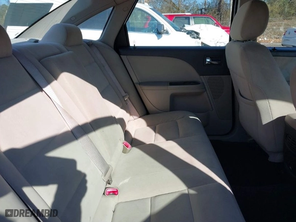 2009 Ford Taurus SE with VIN 1FAHP23WX9G120232, listed as a IAAI auction lot 41449199 with 162694 miles. Bid and sale history available at carsss.com. Image 8.