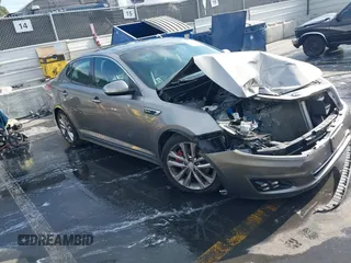 2015 Kia Optima SX Turbo with VIN 5XXGR4A69FG474261, listed as a IAAI auction lot 41103677 with 119,988 mi miles. Bid and sale history available at carsss.com. Image 1.