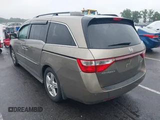 2012 Honda Odyssey Touring с VIN 5FNRL5H98CB060421, выставлен на аукционе IAAI как лот 42378822 с пробегом 249 128 миль миль и . История ставок и продаж доступна на DreamBid. Изображение 3.