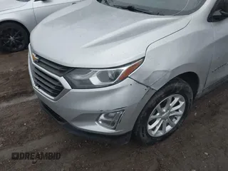 2019 Chevrolet Equinox LS z VIN 3GNAXHEV9KS640830, wystawiony jako IAAI lot #41515333 z przebiegiem 105 077 mil mil oraz . Historia ofert i sprzedaży dostępna na DreamBid. Obrazek 18.