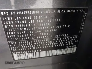 2022 Volkswagen Tiguan S z VIN 3VV0B7AX2NM042934, wystawiony jako IAAI lot #42172199 z przebiegiem 71 367 mil mil oraz . Historia ofert i sprzedaży dostępna na DreamBid. Obrazek 9.