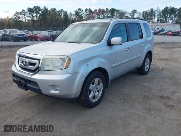 2009 Honda Pilot EX-L with VIN 5FNYF48559B034121, listed as a IAAI auction lot 41928138 with 193,969 mi miles. Bid and sale history available at carsss.com. Image 2.