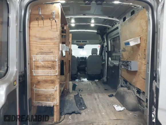 2015 Ford Transit Cargo with VIN 1FTNR1CM6FKA19083, listed as a IAAI auction lot 41790045 with 56,762 mi miles and . Bid and sale history available at carsss.com. Image 18.