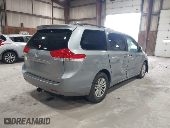 2013 Toyota Sienna XLE AAS with VIN 5TDYK3DC5DS363822, listed as a IAAI auction lot 42019598 with 74,508 mi miles. Bid and sale history available at carsss.com. Image 4.