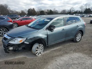 2010 Mazda CX-9 Sport z VIN JM3TB2MA2A0235983, wystawiony jako Copart lot #46122405 z przebiegiem 190 259 mil mil oraz Czysty tytuł • Clean title. Historia ofert i sprzedaży dostępna na DreamBid. Obrazek 1.