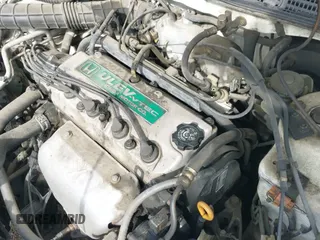 1999 Honda Accord EX z VIN 1HGCG3276XA021722, wystawiony jako IAAI lot #42096737 z przebiegiem 189 452 mil mil oraz . Historia ofert i sprzedaży dostępna na DreamBid. Obrazek 21.