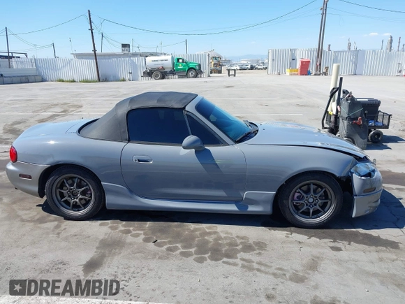 2003 Mazda MX-5 Miata Cloth with VIN JM1NB353930309670, listed as a IAAI auction lot 42234586 with 220,979 mi miles and . Bid and sale history available at DreamBid. Image 13.