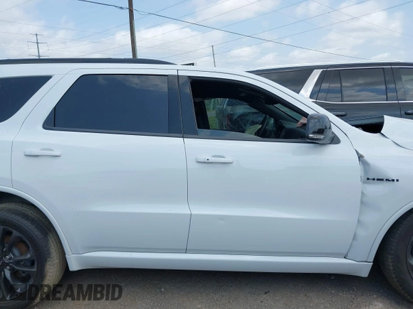 2023 Dodge Durango R/T Plus with VIN 1C4SDHCT7PC686970, listed as a IAAI auction lot 42156304 with 14,592 mi miles and . Bid and sale history available at DreamBid. Image 13.