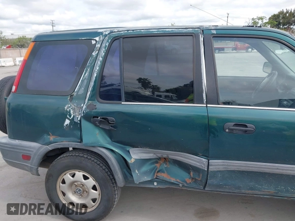 1999 Honda CR-V LX with VIN JHLRD2847XC014469, listed as a IAAI auction lot 41987027 with 307,727 mi miles. Bid and sale history available at carsss.com. Image 6.
