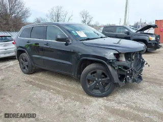 2015 Jeep Grand Cherokee Altitude with VIN 1C4RJFAG2FC956607, listed as a IAAI auction lot 41818479 with 98,879 mi miles. Bid and sale history available at carsss.com. Image 1.