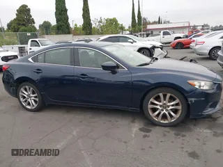 2016 Mazda 6 i Touring z VIN JM1GJ1V50G1401865, wystawiony jako IAAI lot #42334286 z przebiegiem 148 593 mil mil oraz . Historia ofert i sprzedaży dostępna na DreamBid. Obrazek 13.