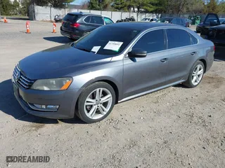 2013 Volkswagen Passat SE w/Sunroof with VIN 1VWBM7A30DC125919, listed as a IAAI auction lot 41759051 with 112,952 mi miles. Bid and sale history available at carsss.com. Image 17.