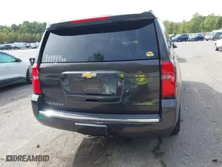 2015 Chevrolet Suburban LTZ with VIN 1GNSKKKC6FR243250, listed as a IAAI auction lot 40464836 with 120,030 mi miles. Bid and sale history available at carsss.com. Image 16.