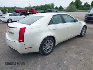 2009 Cadillac CTS RWD with VIN 1G6DF577290173180, listed as a IAAI auction lot 42376810 with 135,111 mi miles and . Bid and sale history available at DreamBid. Image 4.