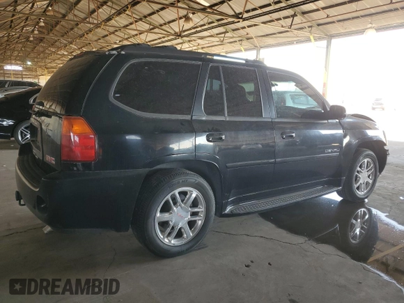 2006 GMC Envoy Denali with VIN 1GKES63M662302685, listed as a Copart auction lot 74315054 with 80,134 mi miles and Salvage Title. Bid and sale history available at carsss.com. Image 3.