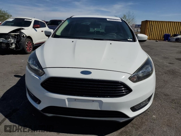 2018 Ford Focus SE with VIN 1FADP3FE4JL322857, listed as a Copart auction lot 58090025 with 58,148 mi miles and Clean title. Bid and sale history available at DreamBid. Image 5.