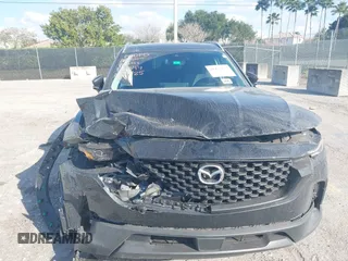 2023 Mazda CX-50 S Premium Plus with VIN 7MMVABEM1PN141344, listed as a IAAI auction lot 41473823 with 12,120 mi miles and . Bid and sale history available at DreamBid. Image 6.