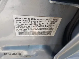 2009 Honda Fit with VIN JHMGE88289S004009, listed as a IAAI auction lot 41803838 with 194,304 mi miles. Bid and sale history available at carsss.com. Image 9.