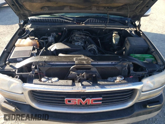 2001 GMC Sierra 1500 SLE z VIN 2GTEC19T811149861, wystawiony jako Copart lot #89205095 z przebiegiem 289 190 mil mil oraz Czysty tytuł • Clean title. Historia ofert i sprzedaży dostępna na DreamBid. Obrazek 11.
