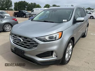2020 Ford Edge Titanium z VIN 2FMPK3K95LBA30633, wystawiony jako IAAI lot #42473515 z przebiegiem 104 190 mil mil oraz . Historia ofert i sprzedaży dostępna na DreamBid. Obrazek 14.