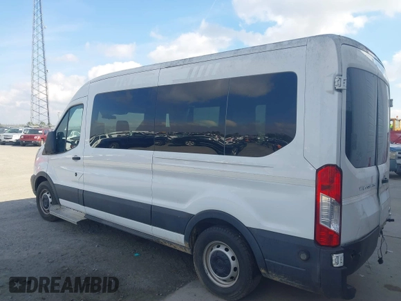 2016 Ford Transit XL z VIN 1FDZX2CM0GKB22459, wystawiony jako IAAI lot #40693295 z przebiegiem 302 216 mil mil oraz . Historia ofert i sprzedaży dostępna na DreamBid. Obrazek 14.