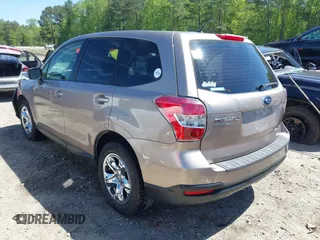 2014 Subaru Forester 2.5i with VIN JF2SJAAC4EH516103, listed as a IAAI auction lot 42065064 with 140,531 mi miles and . Bid and sale history available at DreamBid. Image 3.