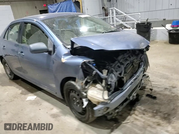 2009 Toyota Yaris with VIN JTDBT903094047243, listed as a Copart auction lot 47296455 with 235,483 mi miles and Salvage Title. Bid and sale history available at DreamBid. Image 10.