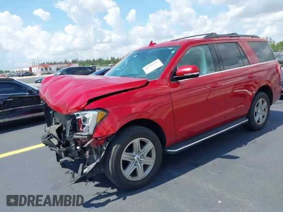 2020 Ford Expedition XLT with VIN 1FMJU1HTXLEA74798, listed as a IAAI auction lot 42181221 with 72,419 mi miles and . Bid and sale history available at DreamBid. Image 2.