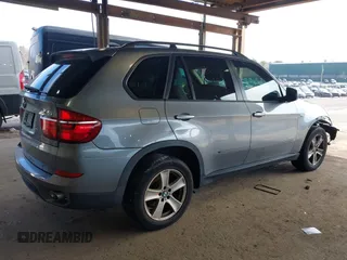 2012 BMW X5 35d with VIN 5UXZW0C59CL673416, listed as a IAAI auction lot 41910233 with 70,008 mi miles and . Bid and sale history available at DreamBid. Image 4.