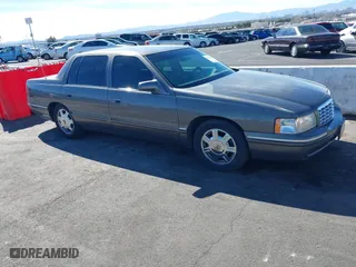 1998 Cadillac DeVille DHS with VIN 1G6KE54Y7WU783104, listed as a IAAI auction lot 41664318 with 1 mi miles. Bid and sale history available at carsss.com. Image 1.