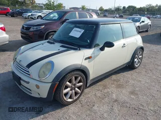 2006 MINI Hardtop with VIN WMWRC33596TK73174, listed as a IAAI auction lot 41848500 with 182,704 mi miles and . Bid and sale history available at DreamBid. Image 2.