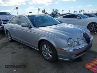 2003 Jaguar S-Type with VIN SAJEA01T83FM48713, listed as a IAAI auction lot 41402152 with 142,875 mi miles and . Bid and sale history available at DreamBid. Image 1.