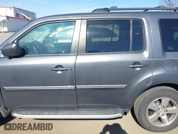 2011 Honda Pilot EX-L with VIN 5FNYF4H69BB015375, listed as a IAAI auction lot 41826235 with 199,171 mi miles and . Bid and sale history available at carsss.com. Image 14.