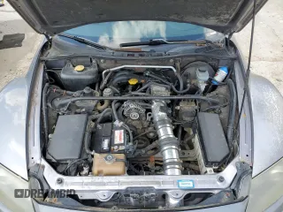 2005 Mazda RX-8 z VIN JM1FE173450141372, wystawiony jako Copart lot #55588025 z przebiegiem 178 213 mil mil oraz Szkody całkowita. Historia ofert i sprzedaży dostępna na DreamBid. Obrazek 11.