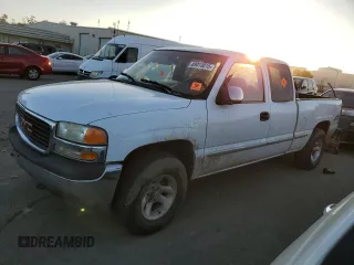 1999 GMC New Sierra 1500 SLE with VIN 1GTEK19T4XE515101, listed as a Copart auction lot 89013015 with 188,729 mi miles and Salvage Title. Bid and sale history available at carsss.com. Image 1.