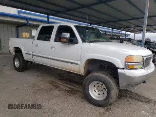 2002 GMC Sierra 1500HD SLE z VIN 1GTGK13U12F187178, wystawiony jako Copart lot #86453504 z przebiegiem 187 711 mil mil oraz Szkody całkowita. Historia ofert i sprzedaży dostępna na DreamBid. Obrazek 4.